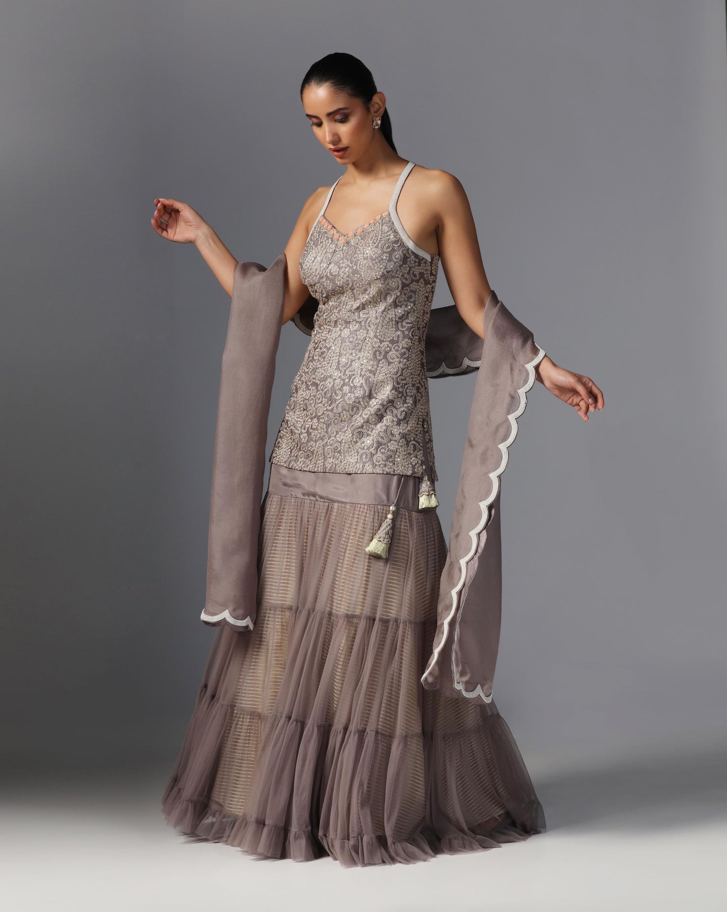 Smoky Taupe Tiered Lehenga Set Description:
