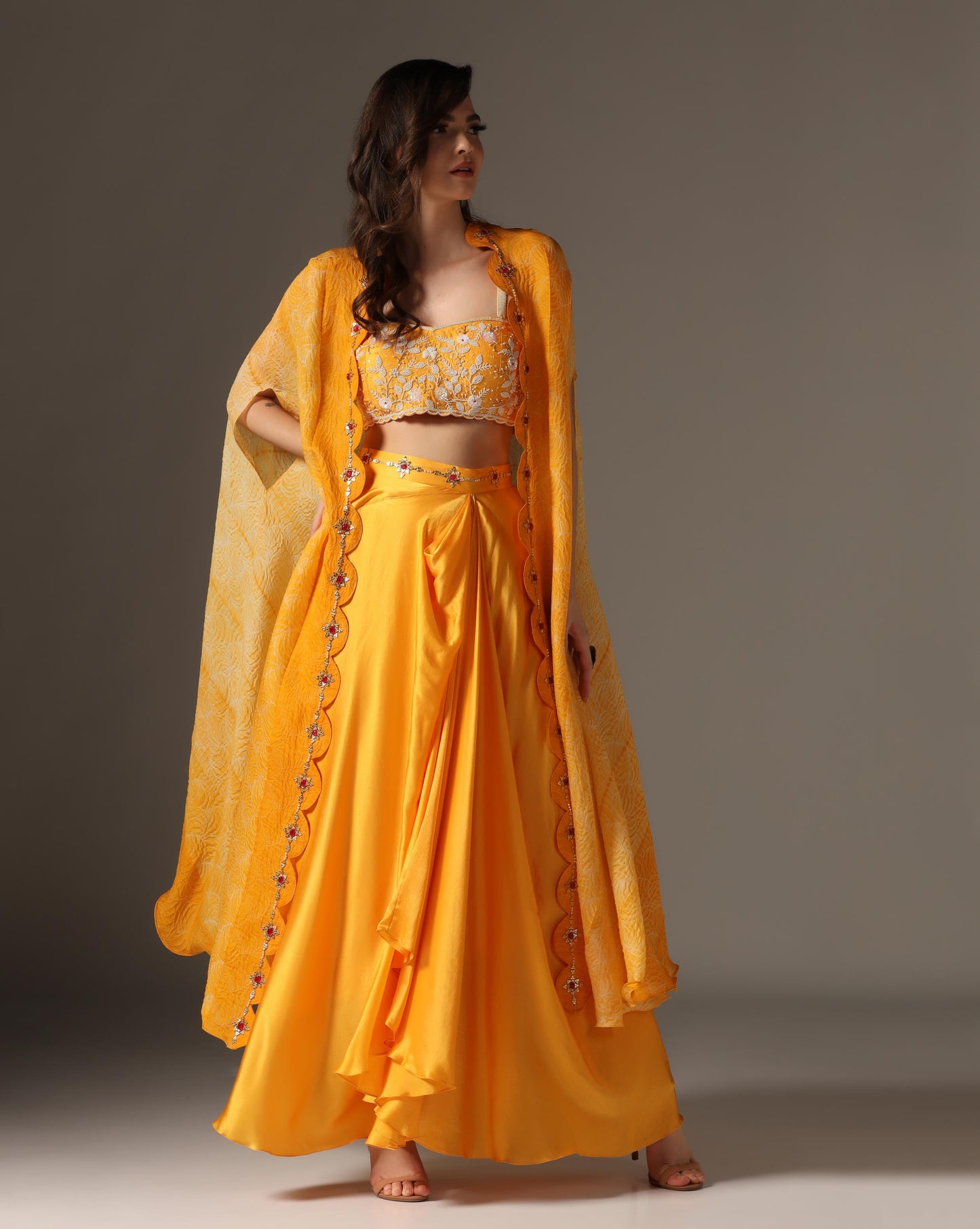 Shibori cape with draped skirt