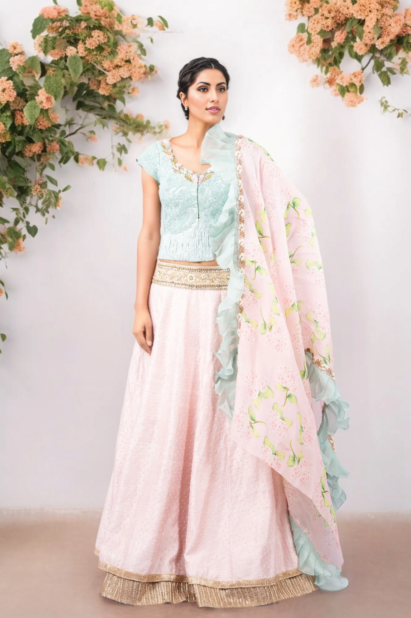 PERSIAN DORI ECO GREEN BLOUSE WITH FRINGES PAIRED WITH PEARL WORK PINK RAW SILK LEHENGA