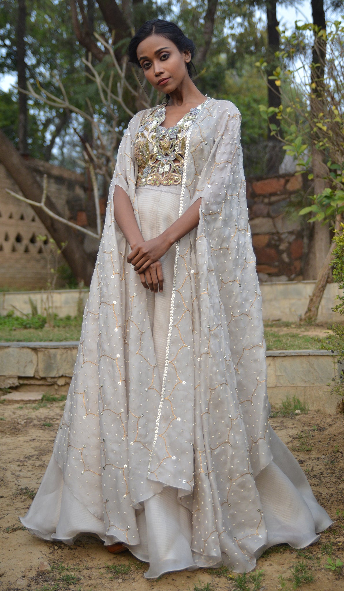 CUTWORK BLOUSE WITH EMBROIDERED CAPE