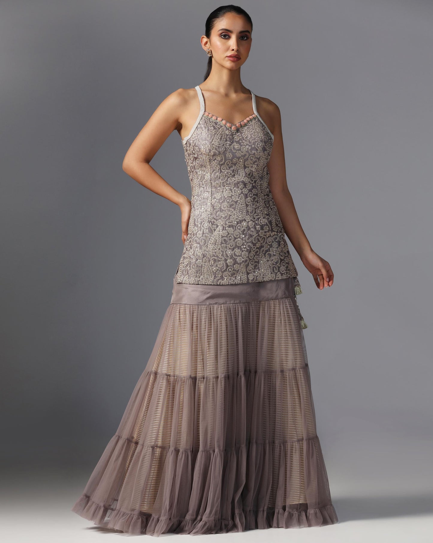 Smoky Taupe Tiered Lehenga Set  Description: