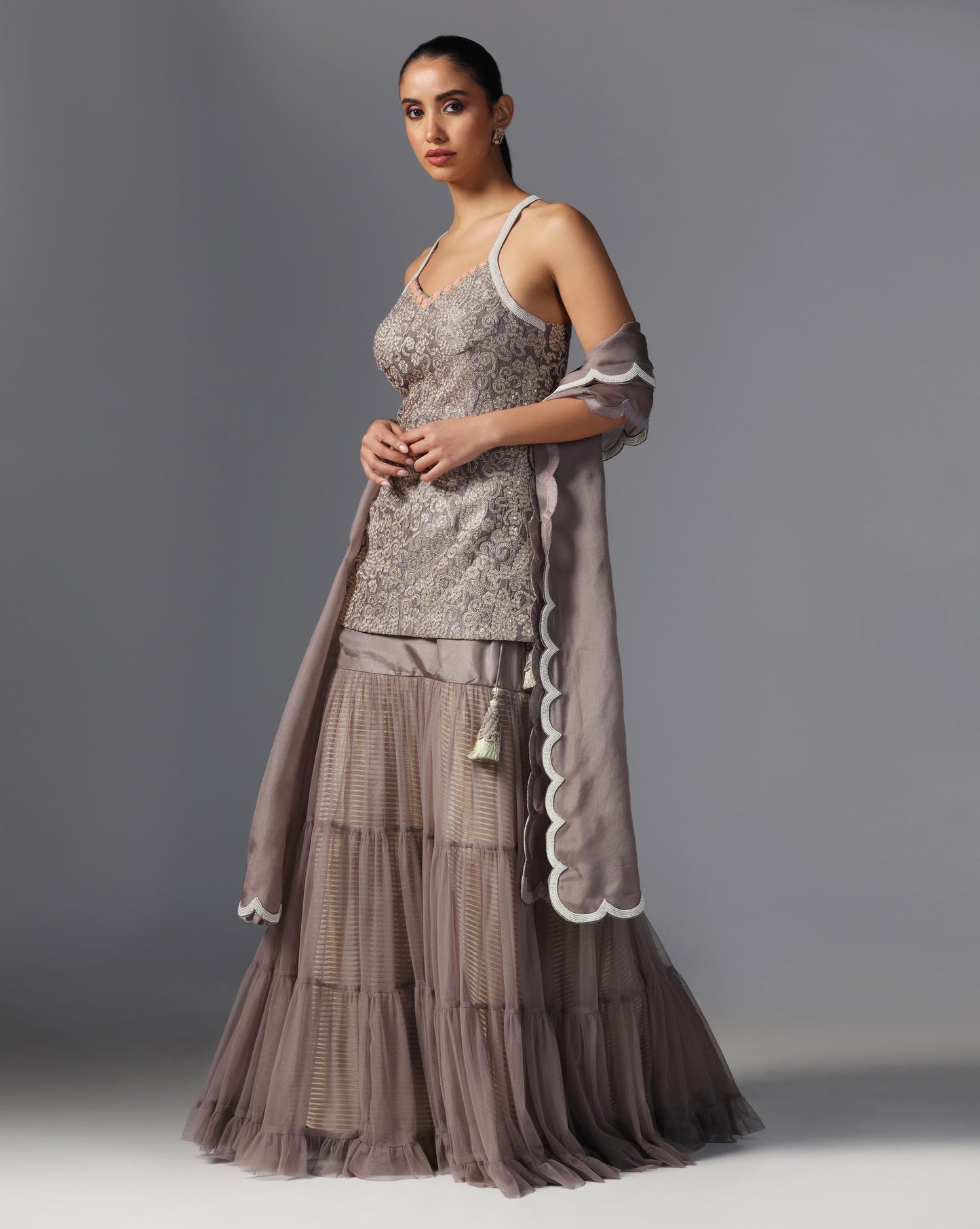 Smoky Taupe Tiered Lehenga Set  Description: