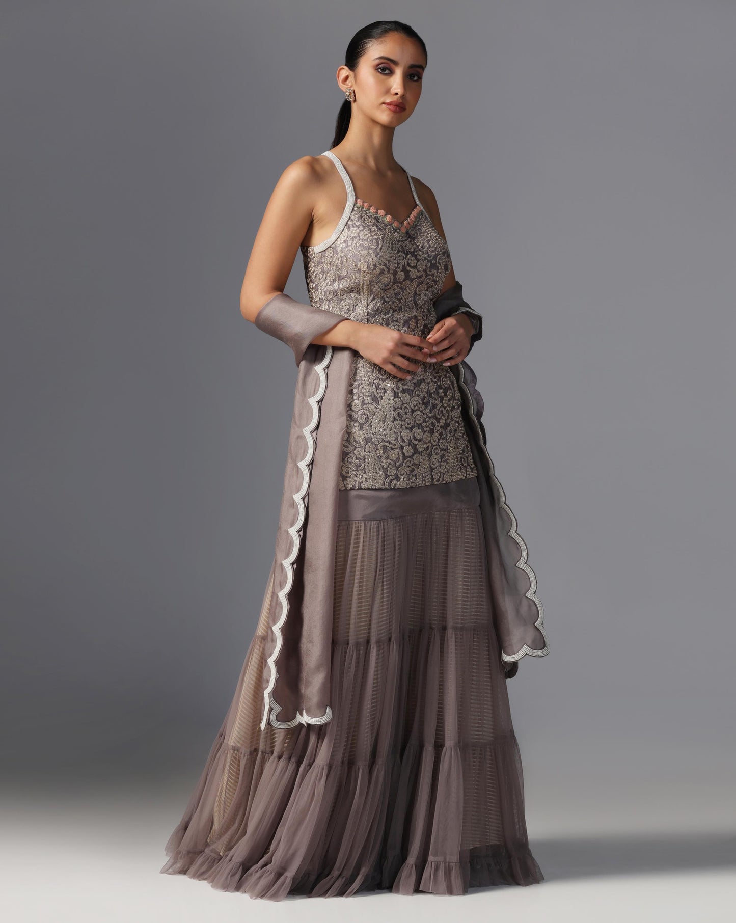 Smoky Taupe Tiered Lehenga Set  Description: