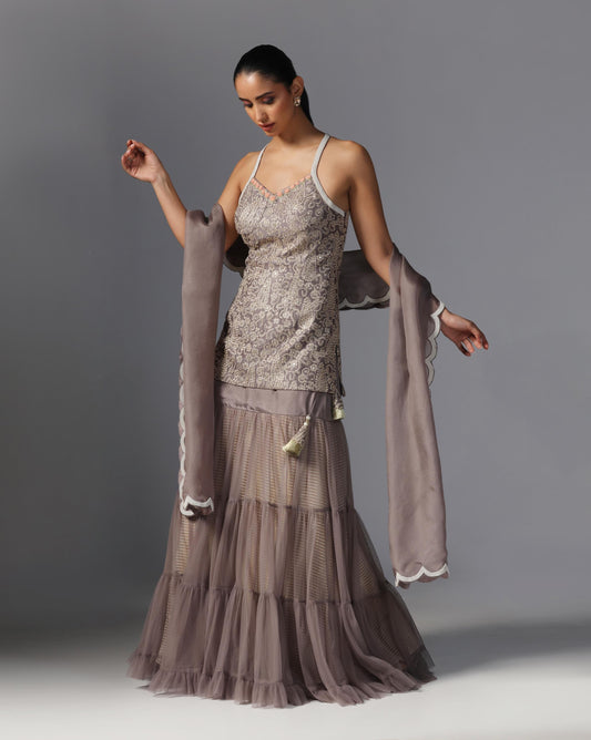 Smoky Taupe Tiered Lehenga Set  Description: