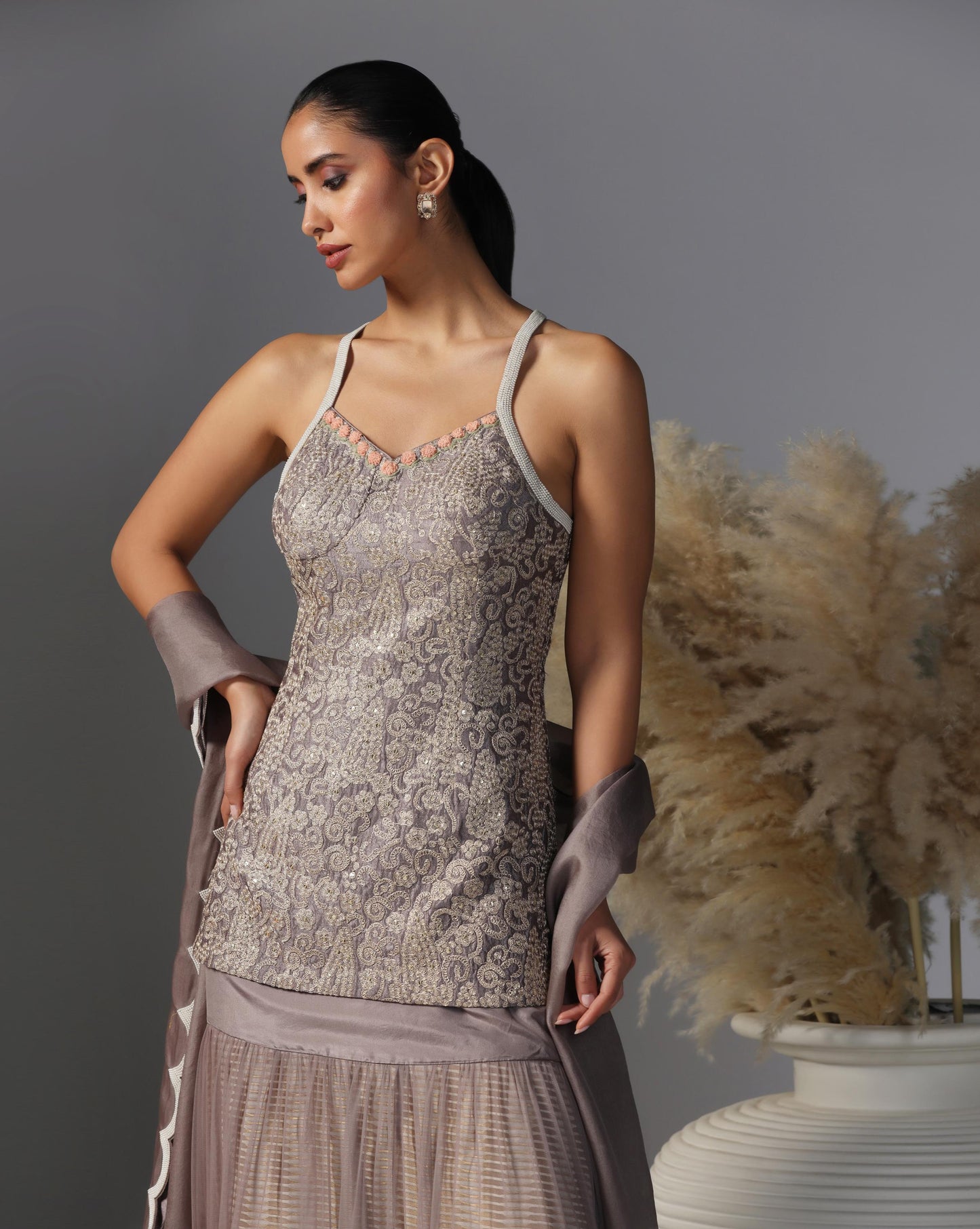 Smoky Taupe Tiered Lehenga Set  Description: