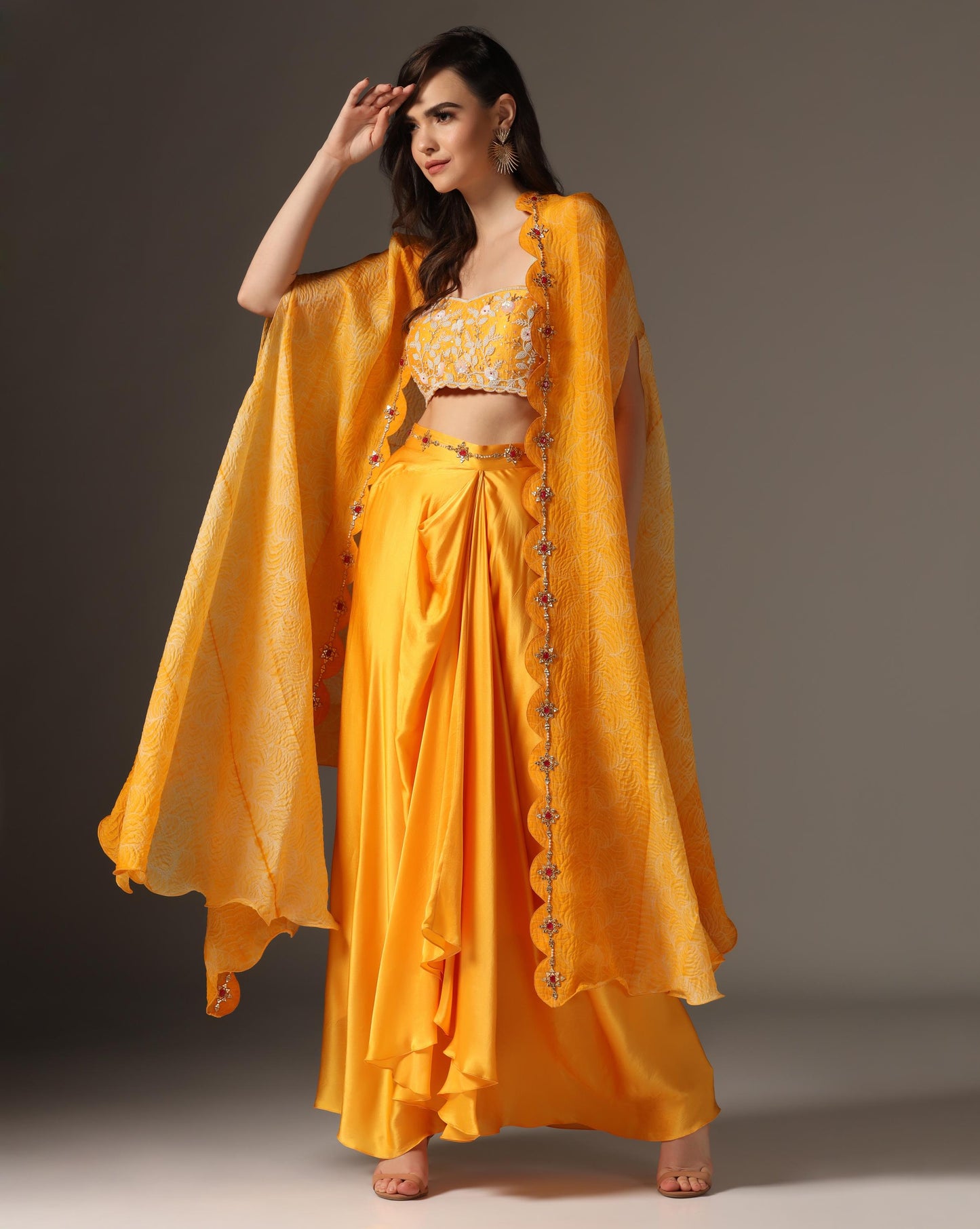 Shibori cape with draped skirt